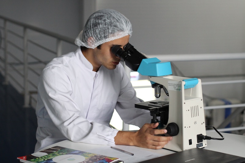 a photo showing a microscope being used