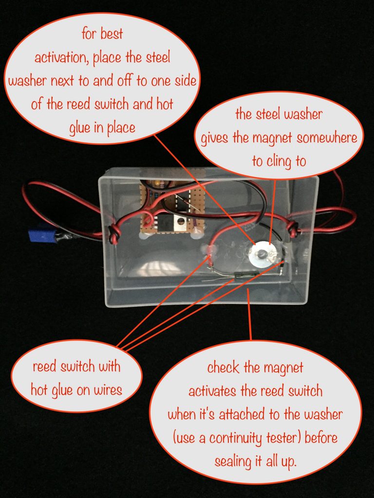photo showing how to place the reed switch and steel washer for the activation magnet