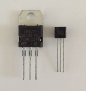 a photo comparing the sizes of the two LM317 packages